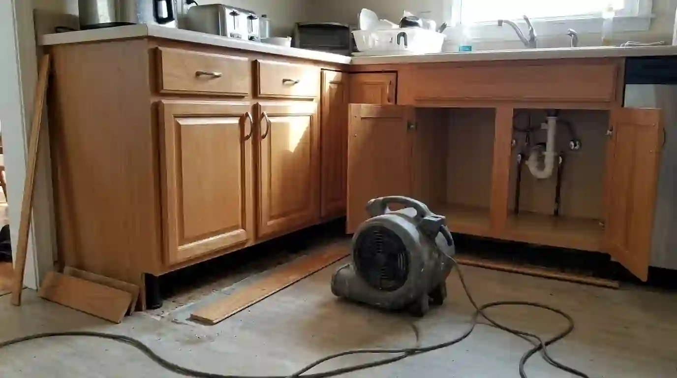 Drying under kitchen cabinets through the toe kick in Oklahoma City