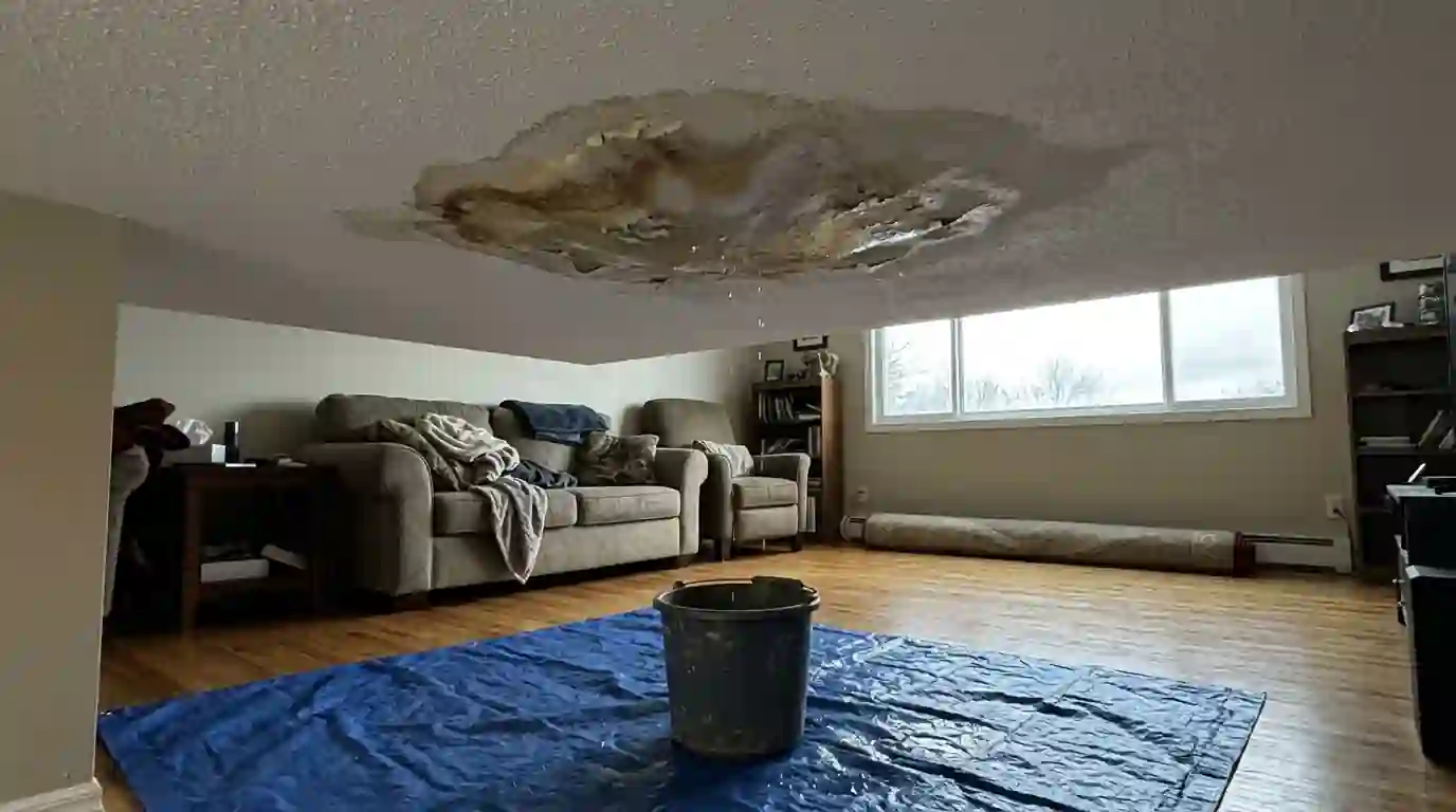 Water-stained sagging ceiling in an Oklahoma City living room